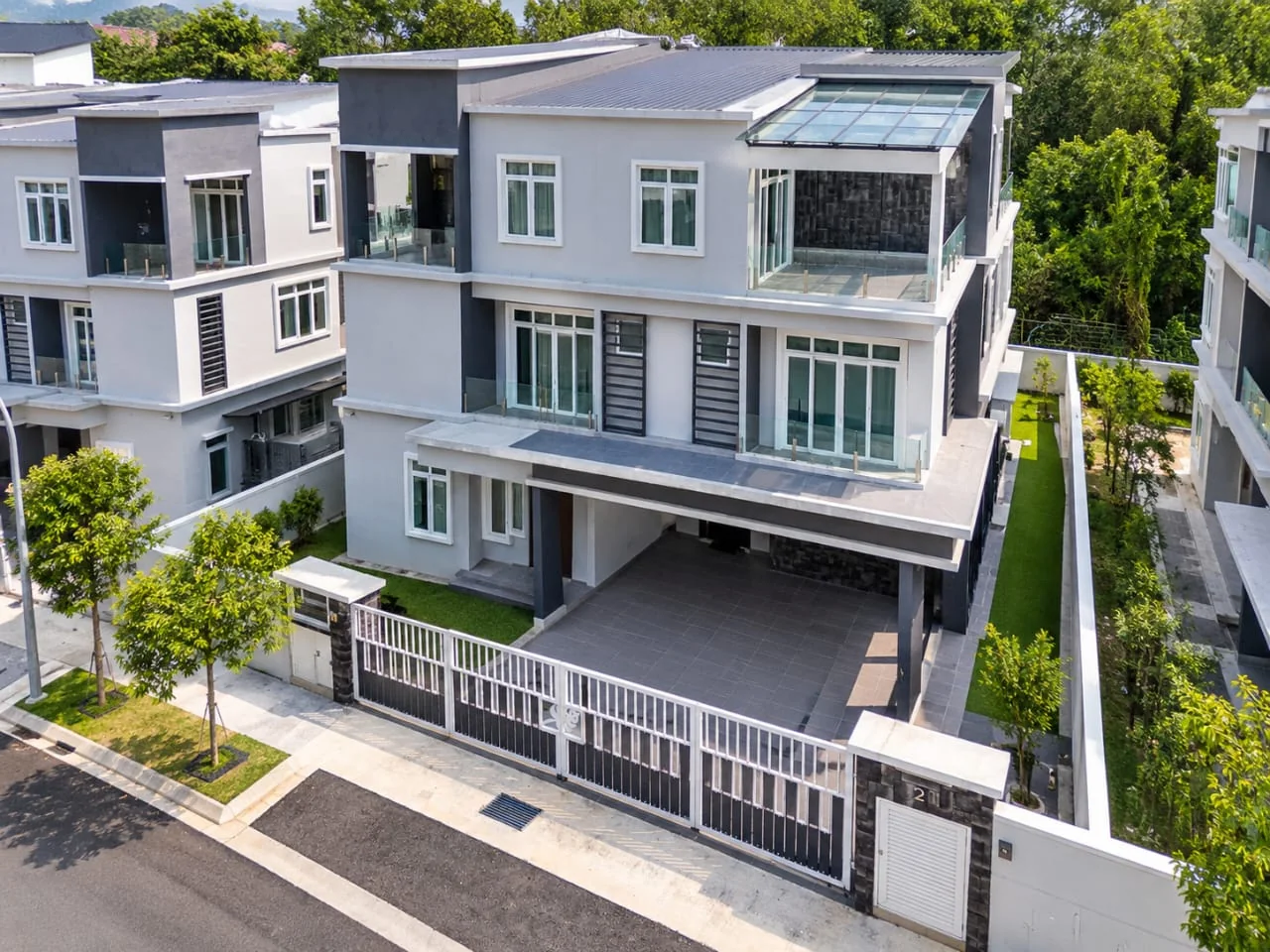 Frontage of the completed TTDI Heights three-storey bungalow with covered driveway